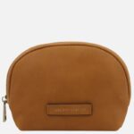 Brown leather coin purse with a top zipper and a small stitched 'Tuscany Leather' badge on the front.