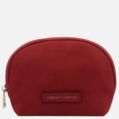 Red rounded leather pouch with a gold zipper and a small Tuscany Leather tag on the front.