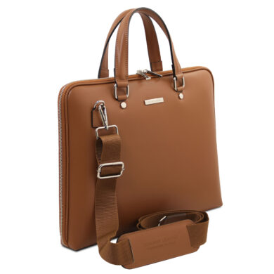 Brown leather tote-style bag with top handles and an adjustable removable shoulder strap, front view