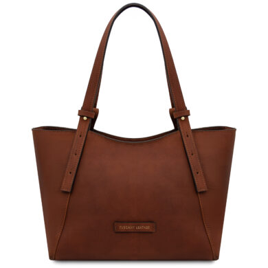 Brown leather tote bag with two shoulder straps and a small front patch label.