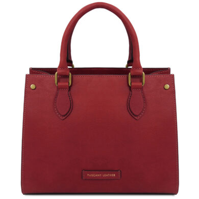 Red handbag with two handles and brass hardware, Tuscany Leather label on the front.
