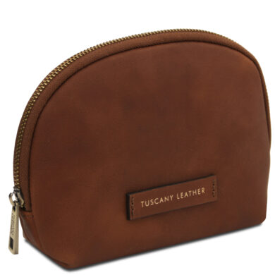 Brown leather oval pouch with gold zipper and a Tuscany Leather label on the front.
