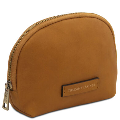 Tan leather coin purse with a curved top zipper and a small Tuscany Leather tag on the front.