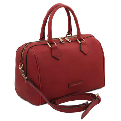 Red leather handbag with two top handles, gold zippers, and an optional long strap for crossbody wear, branded Tuscany Leather